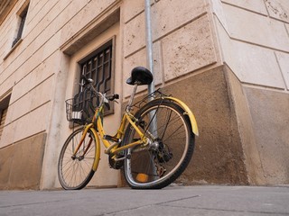 Fototapeta na wymiar Yellow broken bicycle