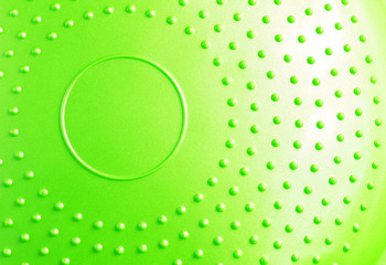 Green balance massage cushion closeup. Balance equipment for fitness and recreation