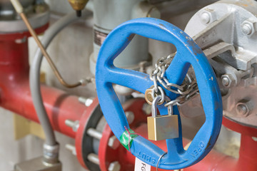 padlock and chain to lock valve.