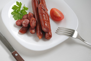 Sausages on a white background