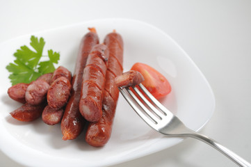 Sausages on a white background
