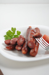 Sausages on a white background