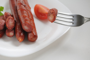 Sausages on a white background
