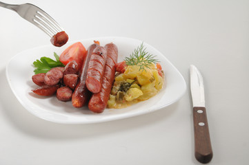 Sausages on a white background