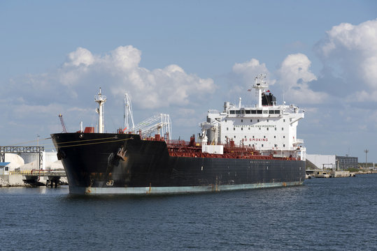 Chemical tanker ship alongside a berth in port