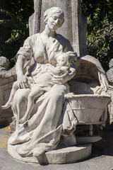 Fototapeta na wymiar Le Petit Quinquin statue at the Alexandre Desrousseaux Monument in Lille
