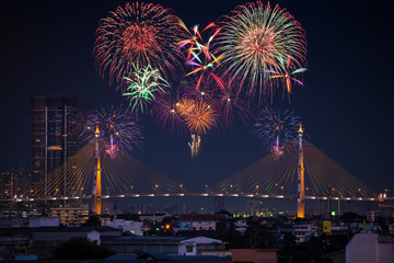 Fototapeta premium Beautiful firework display on celebration night, showing on the river 