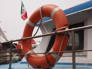 Life buoy and Italian flag