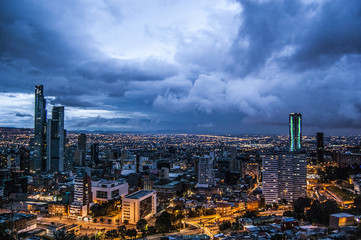 Amazing wallpaper Bogotà city on Night, Colombia, America. Cloudy sky