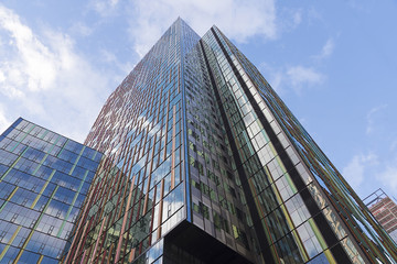 Fototapeta premium Looking up at an office tower in downtown Seattle