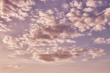 Obraz premium Beautiful clouds in the blue sky on a spring day in the sunlight.