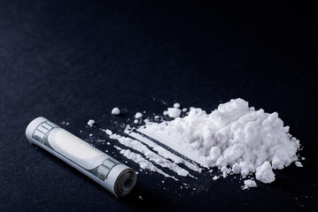 Heroin divided into tracks on the table
