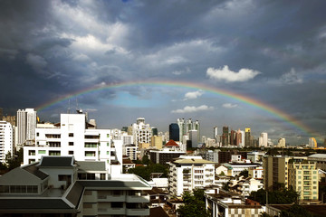 Scene of full rainbow in the city