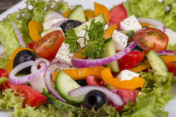 Fresh vegetable greek salad on the table