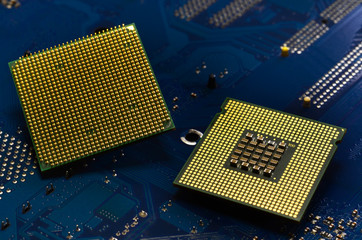 Close up of CPU Processor over Computer Motherboard. Tecnology background.
