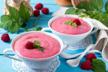 Raspberry mousse in a white bowl