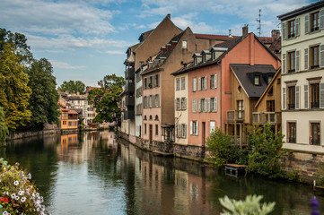 Fototapeta na wymiar Typical street near a channel in Strasbourg