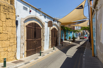 Fototapeta na wymiar Narrow street in the historic old town Larnaca, Cyprus