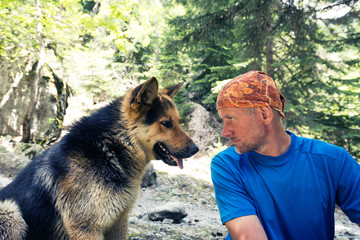 Real male friendship - a man adventurer and his dog