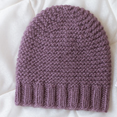 hat bound manually of dark red wool