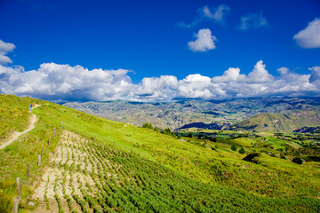 Beautiful landscape of the mountains near of Quilotoa volcano with some agriculture lands. Quilotoa is the western volcano in Andes range and is located in andean region of Ecuador
