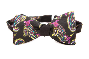 Bow tie with surreal drawing on an isolated white background