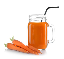 Mason jar of delicious carrot juice, on white background