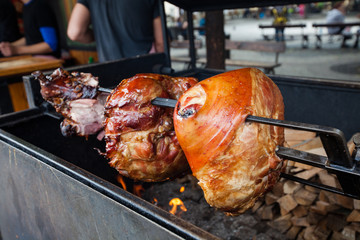 Knuckle of pork cooked on an open fire in the brazier