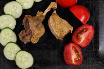 Cooking the duck in the oven with vegetables