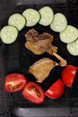 Cooking the duck in the oven with vegetables