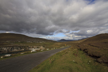 Lonesome Road under dark clouds, Achill, Ireland