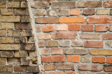 Two types of masonry. Connecting two houses