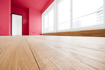 empty room, wooden floor in new apartment