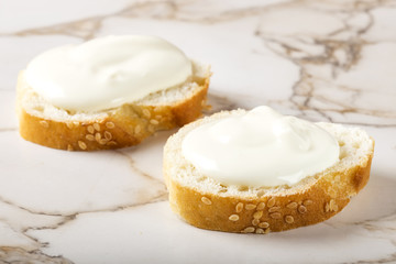 Sesame bagel with cream cheese