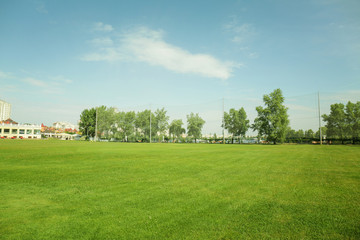 Landscape with big golf course on sunny day