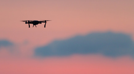 Fototapeta na wymiar Drone flies over a colourful sunrise sky.