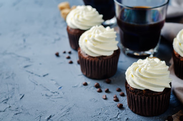Chocolate cupcakes with ricotta cream frosting