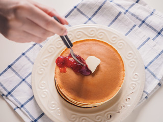Pancakes with butter and jam