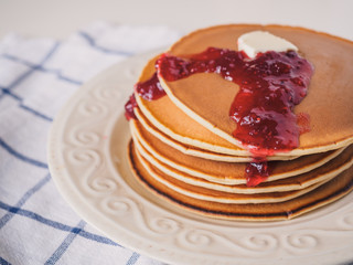 Pancakes with butter and jam