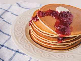 Pancakes with butter and jam