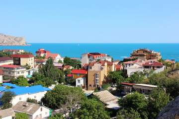 Fototapeta na wymiar Resort town on the coast in the summer.