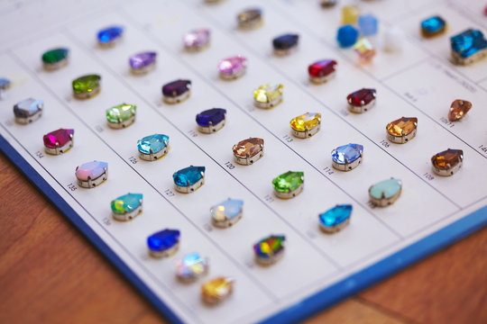 Catalog of crystals for embroidery on fabric, elegant luxury sewing accessories - Powered by Adobe