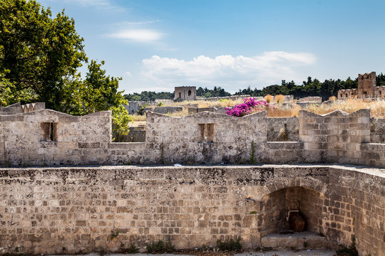 Ruins of the castle and city walls of Rhodes. Defensive Fortress of the Joannites.Historic castle on the shores of the Aegean and Mediterranean.