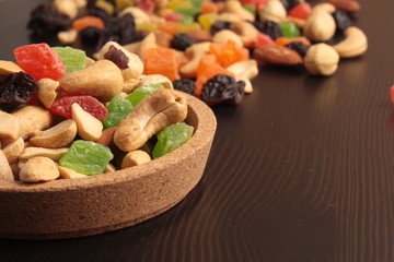 Dried fruits on a wooden background