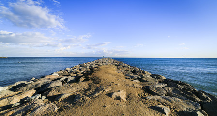 Barcelona beach stone pier in the Barceloneta