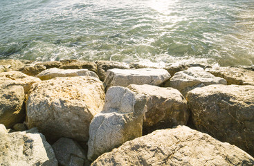 Fototapeta na wymiar Barcelona beach stone pier in the Barceloneta