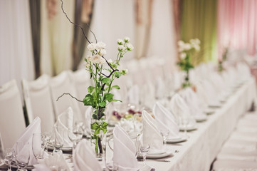 luxury wedding decorations with gentle rose, flowers composition on ceremony place