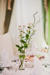 luxury wedding decorations with gentle rose, flowers composition on ceremony place