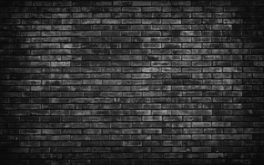 Fototapeta na wymiar Old black brick wall background.