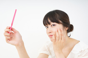 Young woman doing skin care